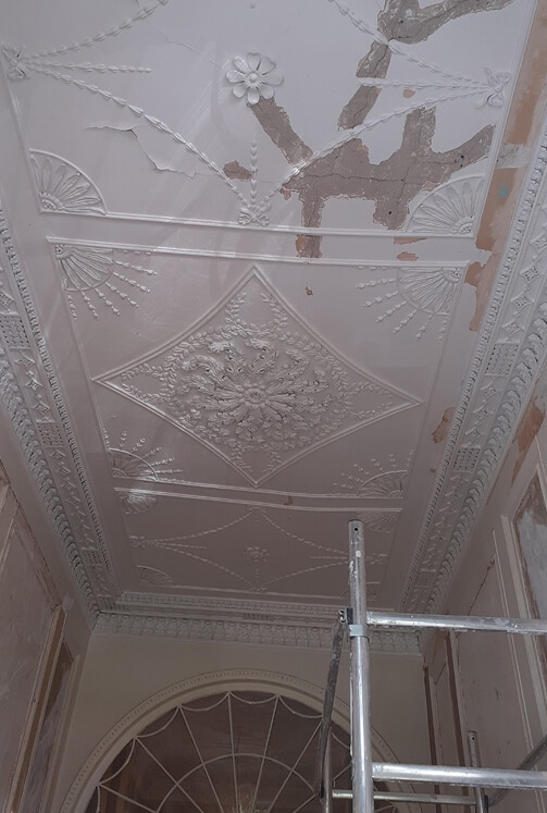 Damaged ceiling before restoration